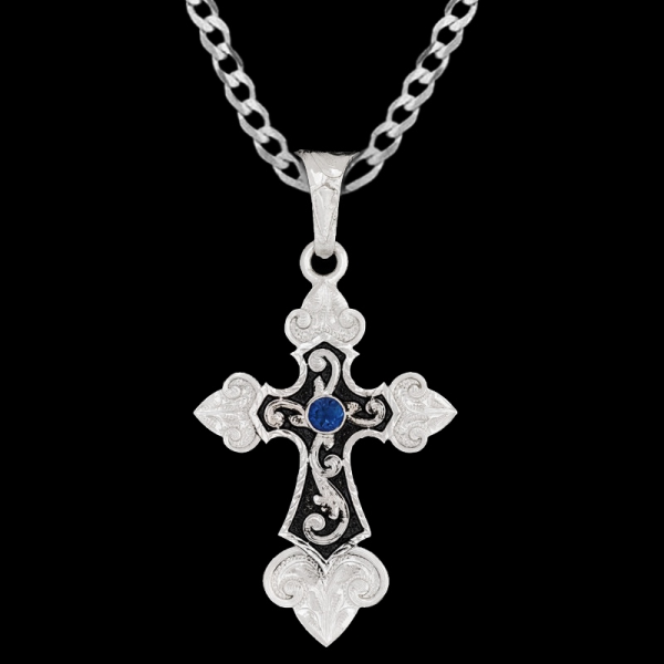 The Chronicles Cross Pendant Necklaces is a one of a kind german silver cross, featuring silver scrollwork with black enamel and a customizable stone. Pair it with a special discount sterling silver chain today!
 
